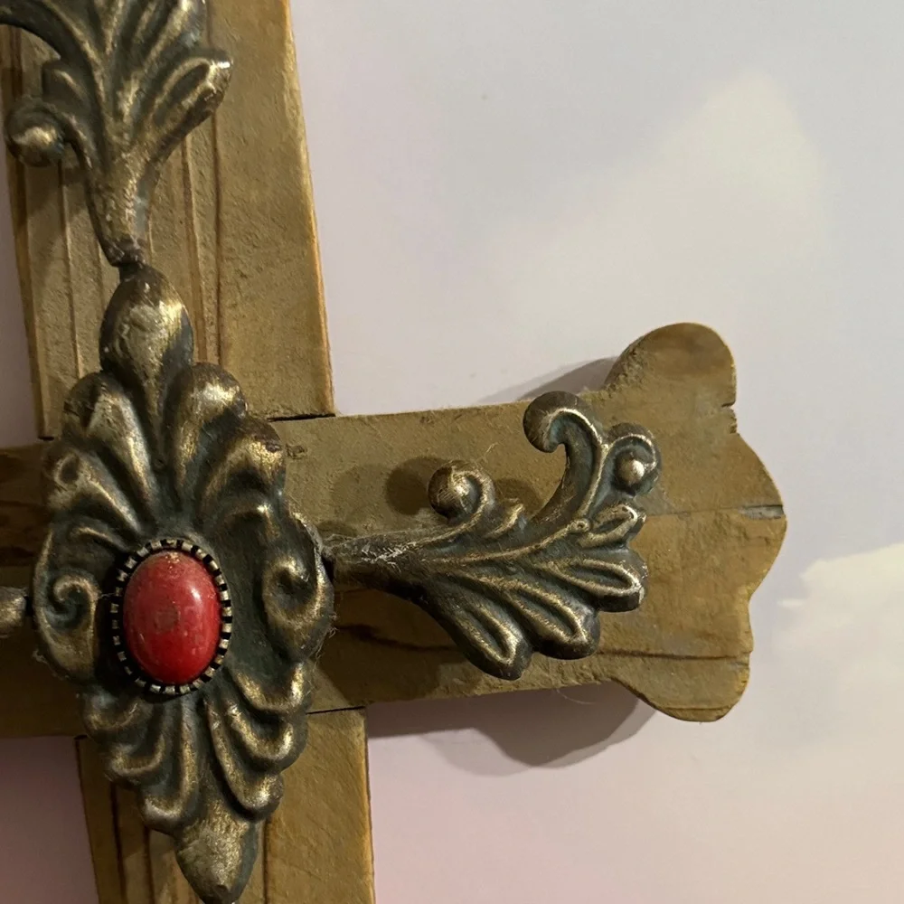 Rustic Wooden Cross with Golden Accents and Red Gem